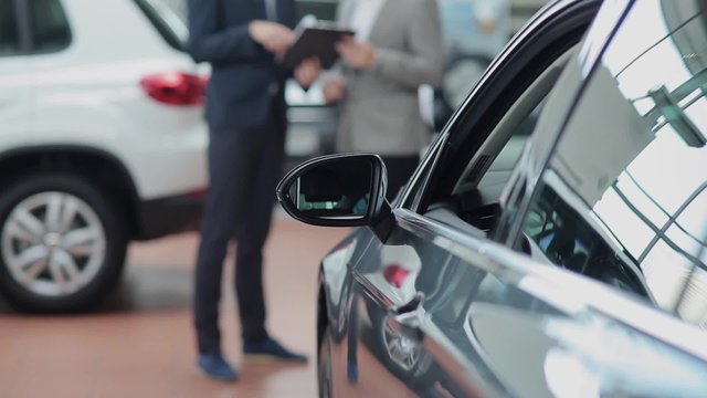 Sales manager explains the terms of the deal