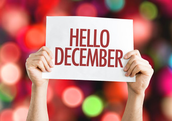 Hello December placard with red bokeh background © gustavofrazao