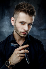 Brutal man with straight razor