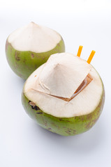 Fresh coconut juice drink on wood panel