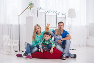 happy family in white interior