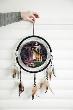 dreamcatcher in hand