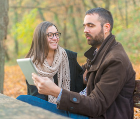 Fototapeta premium Young couple with tablet computer