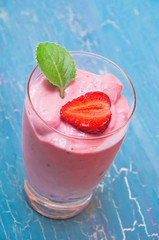 cocktail in a glass on a blue background