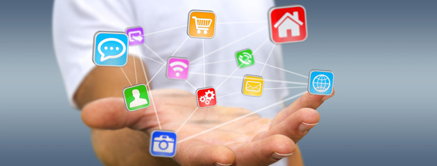 Young man holding digital application