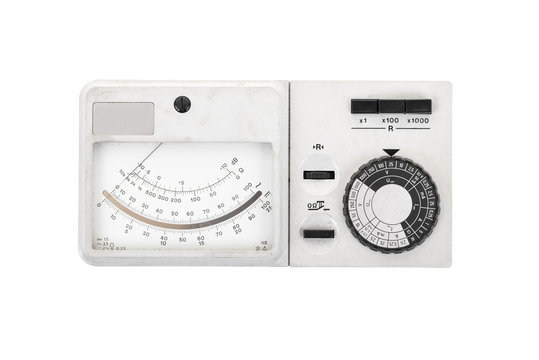 Vintage electrical multimeter on white