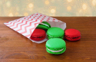 Colorful French Macarons on wooden background