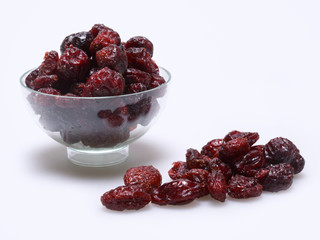 Still life of dried red currants, white background