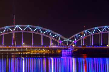 Riga. Railway bridge at night.