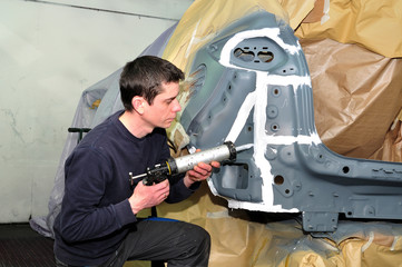 car body worker.