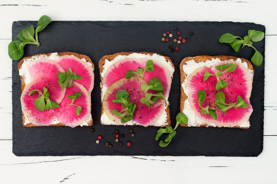 Bruschetta With Goat Cheese, Watermelon Radish And Corn Salad