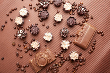 Fototapeta na wymiar chocolate candies and coffee beans