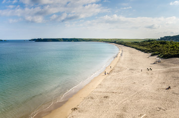 Fototapeta na wymiar Beautiful Sand Beach in Wales on a Cloudy Spring Day