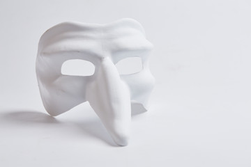 white venetian mask on a white background