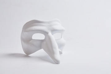 white venetian mask on a white background