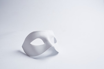 white venetian mask on a white background