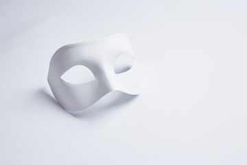 white venetian mask on a white background