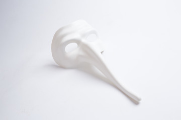 white venetian mask on a white background