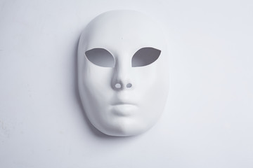 white venetian mask on a white background