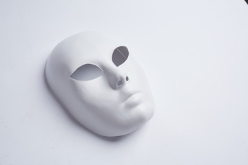 Naklejka premium white venetian mask on a white background