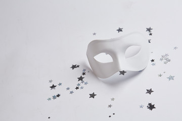 white venetian mask on a white background
