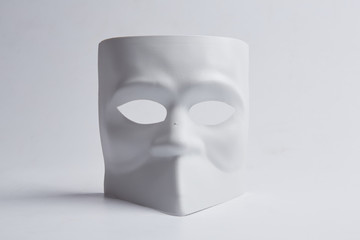 white venetian mask on a white background