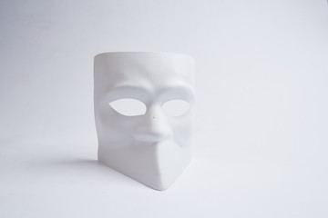 white venetian mask on a white background