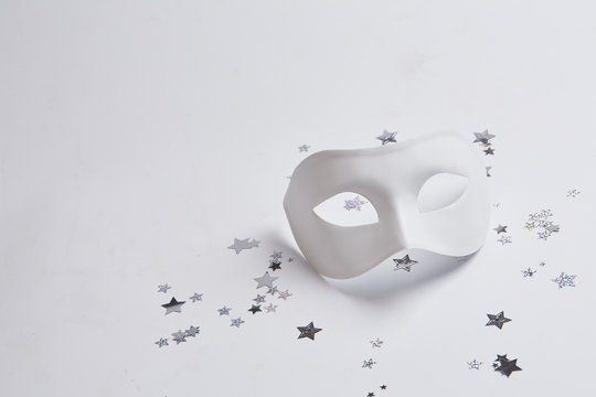 white venetian mask on a white background