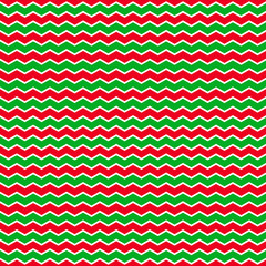 Christmass background with green and red zig-zag stripes.