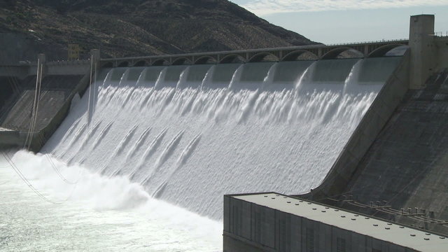 Medium wide shot of the spillway on the Grand Coulee hydroelectric dam in Washington, USA