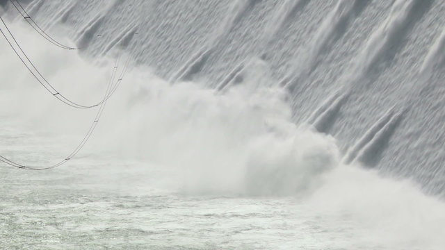 Close shot of the bottom portion of the spillway and cables of the Grand Coulee hydroelectric dam in Washington, USA
