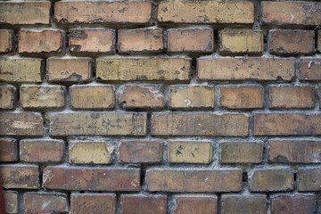 An old stained brick wall