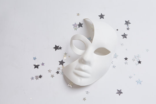 white venetian mask on a white background