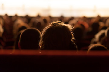 audience watching theater play