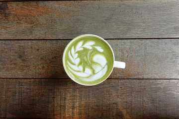 A cup of green tea matcha latte.