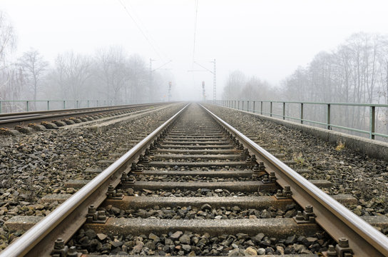 Railways leading to the hazy horizon