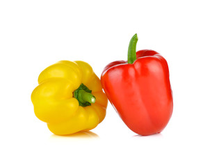 Two fresh peppers isolated on white background