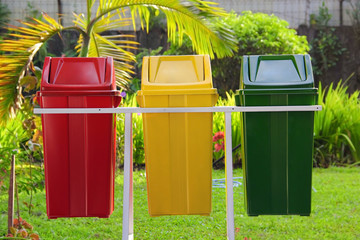 Colorful trashcans in a park