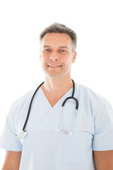 Fototapeta premium Happy Male Surgeon Against White Background