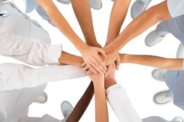 Directly Above Shot Of Medical Team Standing Hands