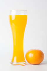 Orange juice and slices of orange isolated on white