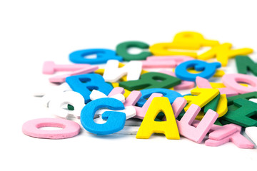 Fototapeta premium close up wooden colorful English alphabet on white background