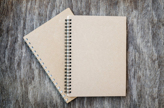 Blank Notebook on the Wooden Table