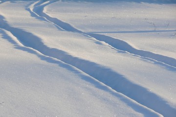car track on snow