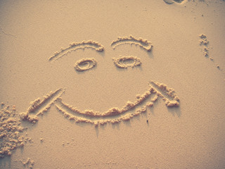 Smiling Face on Sand - Similan Islands, Thailand