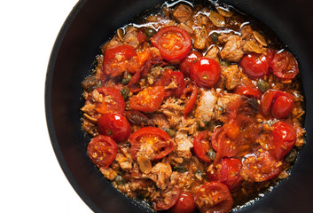 sauce with tuna, capers and cherry tomatoes. for cooking spaghet