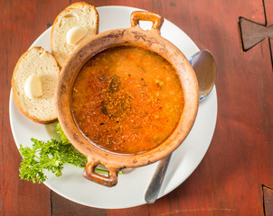 Fish soup with bread and garlic