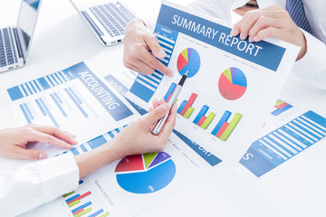 Business people discussing the charts and graphs showing the res