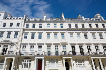 Fototapeta na wymiar White luxury houses facades in London, english architecture