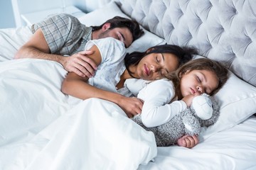 Family sleeping together